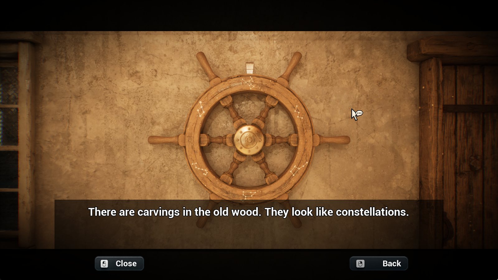 A ship's wheel carved with constellations